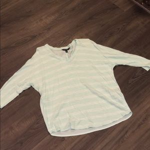 Mint green v-neck top with white stripes